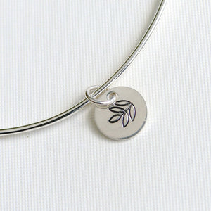 One Sterling Silver Bangle with Multi Leaf Stamped Charm